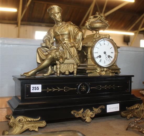 Black and gilded mantel clock. (movement needs attention)